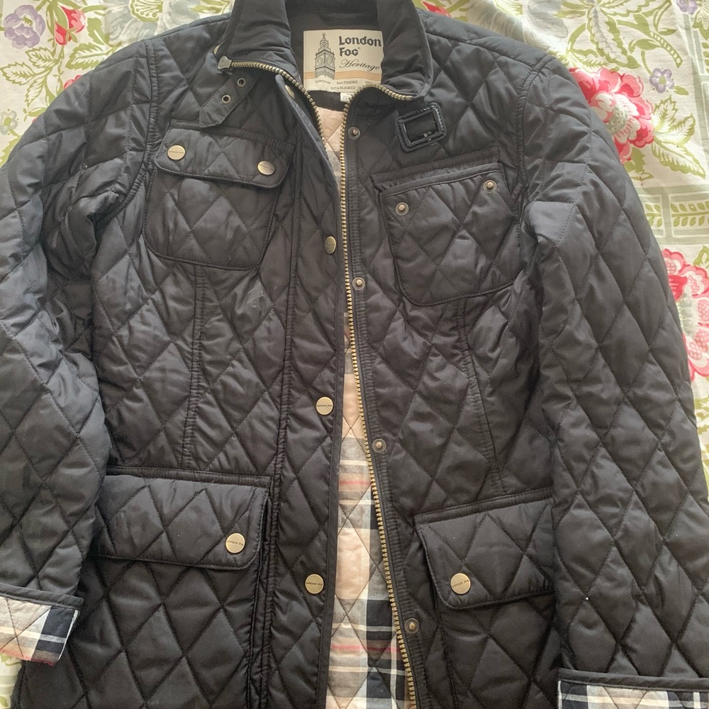 London fog black jacket with plaid lining, zips and snap closure.